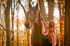 woman and warmblood