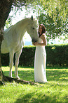 woman and white horse