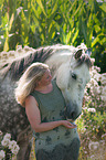 woman and Haflinger-Andalusian