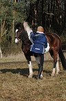 climbing a horse