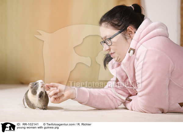 young woman with guinea pig / RR-102141