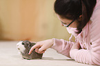 young woman with guinea pig